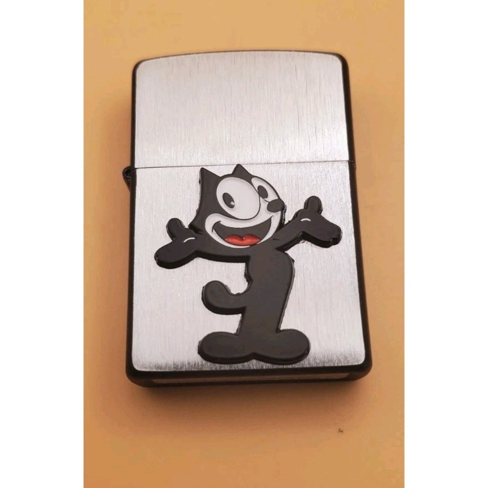 Zippo Lighter With A Cartoon Cat Emblem Silver And Black,  Unused